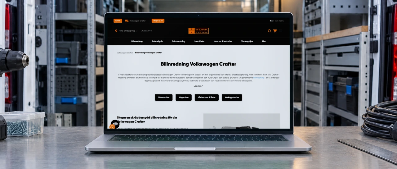 Work System's page “Bilinredning Volkswagen Crafter”, van racking for the Volkswagen Crafter, open on a laptop on a steel workbench in a van outfitting workshop, in front of a white van with its rear doors open and shelving fitted inside.
