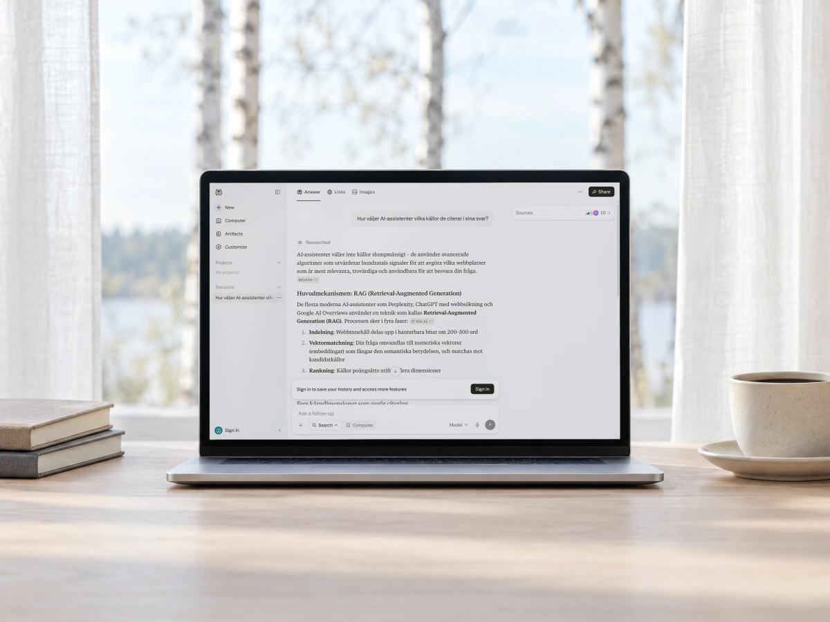 Perplexity answering how AI assistants choose which sources to cite, with its sources beside the answer, on a laptop on a pale desk by a window with birch trees