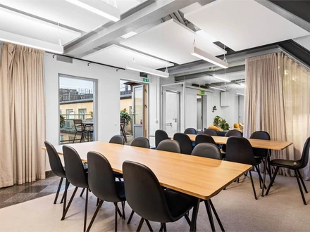 The meeting room at the office, with doors out to a roof terrace